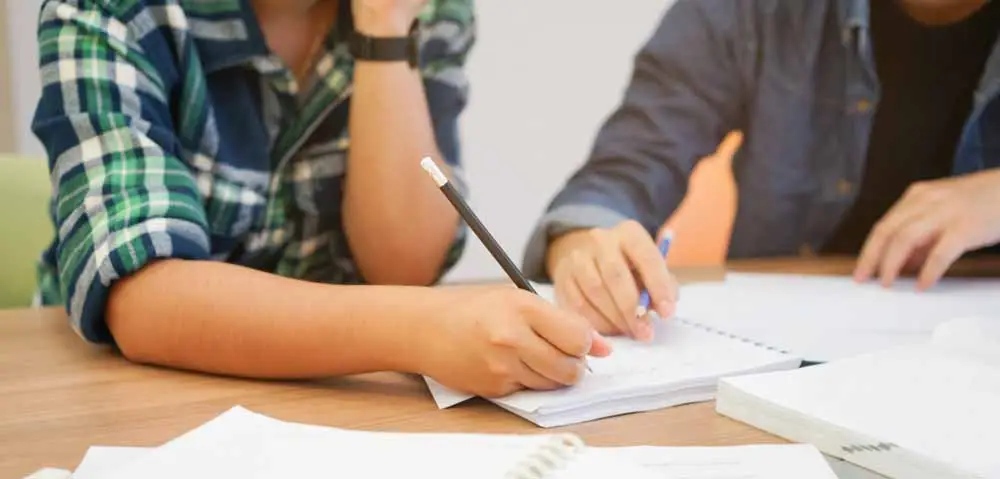 Student taking a private lesson with an English teacher.