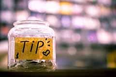 A tip jar representing English language learning tips.